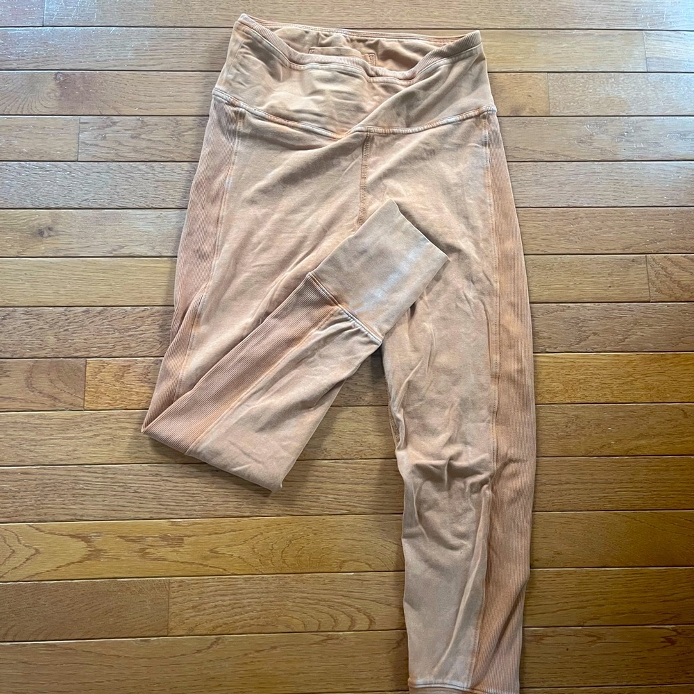 Free people leggings in a burnt orange color. Never worn and in good condition.